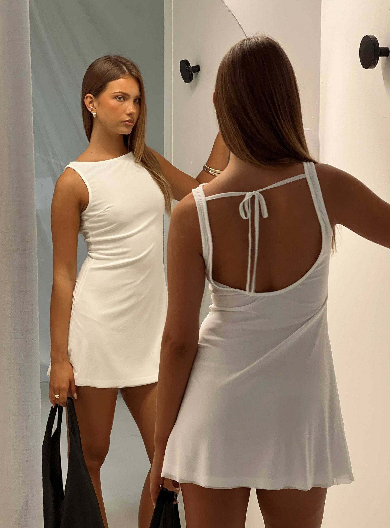 0-modelinfo-emma-us2_014dc78d-aa60-4b11-82f6-edbb66b9fcd0 Lukea Sleeveless Mini Dress White - Image 1
