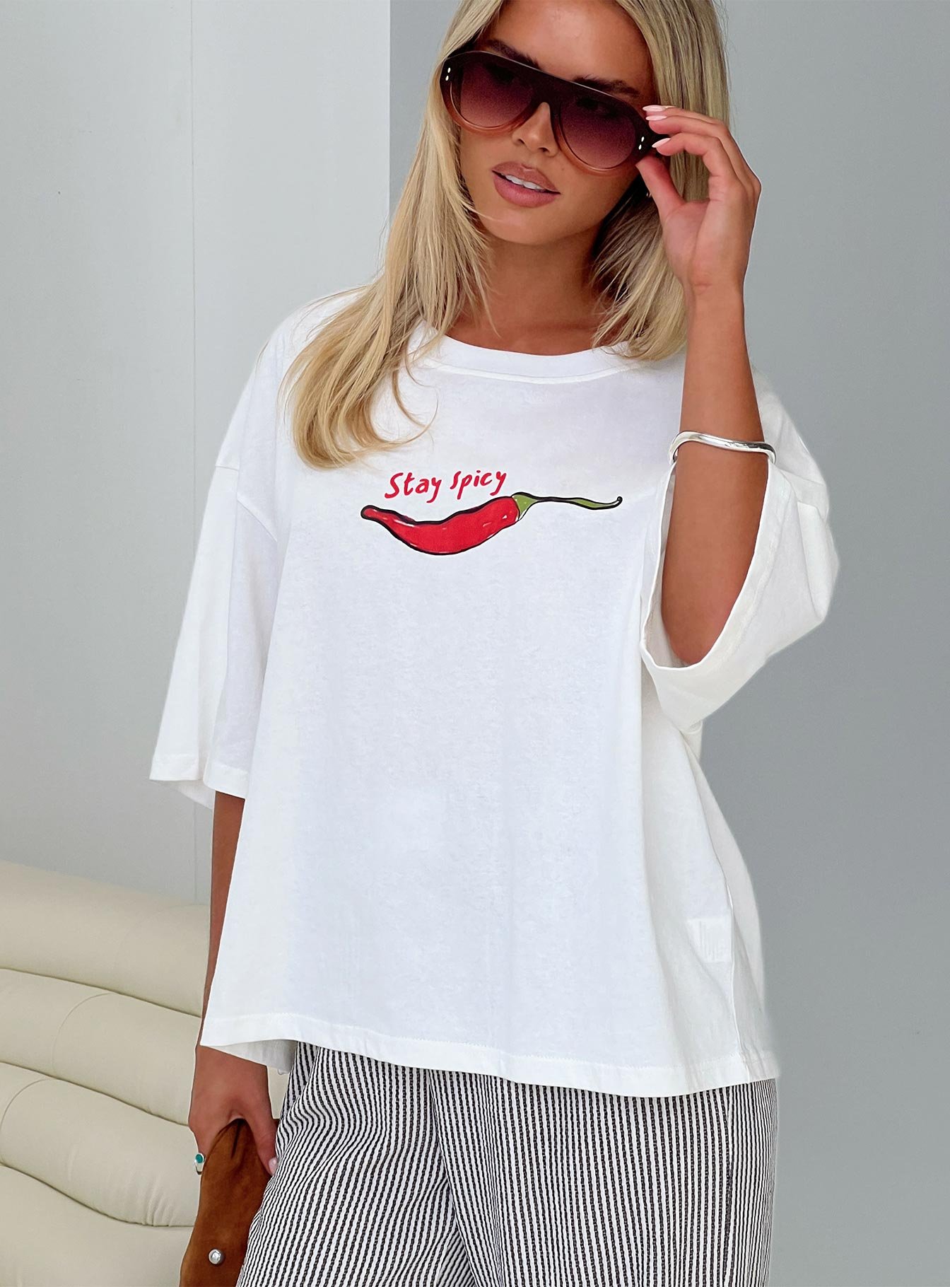 0-modelinfo-hollie-us2_702feb84-bce3-4968-87a8-80262cb701e3-1 Stay Spicy Graphic Top White - Image 1
