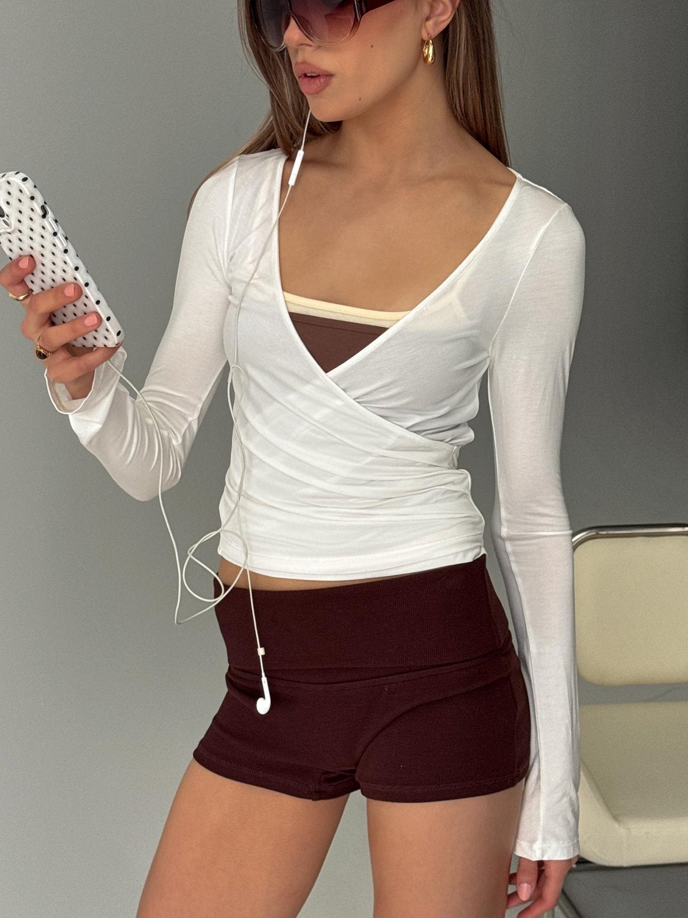 0-modelinfo-rafaela-us2_b13d460b-bb0a-4a06-a15e-c7daf562f985-1 Sylka Long Sleeve Jersey Wrap Top White - Image 1